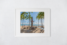 Load image into Gallery viewer, Duke Kahanamoku statue, palm trees, canoe, tiki torches, sand, ocean, Matted Photo Print, Image