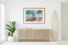 Load image into Gallery viewer, Duke Kahanamoku statue, palm trees, canoe, tiki torches, sand, ocean, Framed Matted Photo Print, Interior Entryway, Image